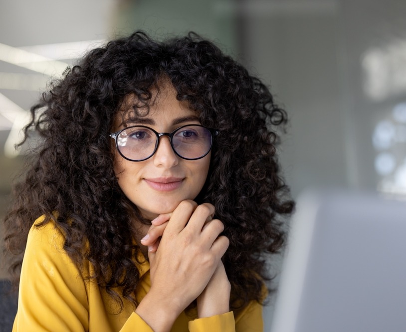 Young Woman in Yellow Stares at Screen_2646404007_edited