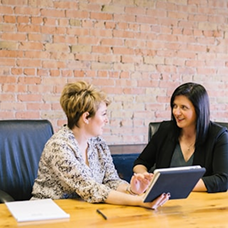 people-talking-at-conference-table