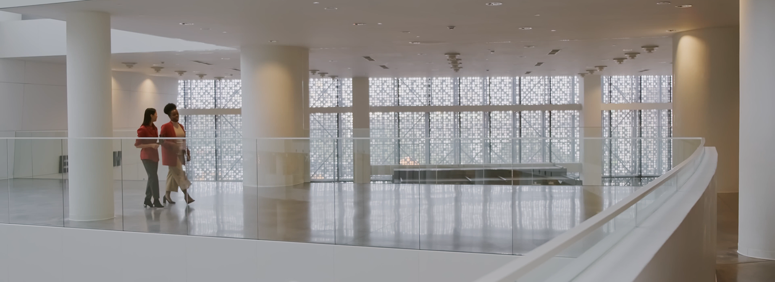 people-walking-through-building-foyer